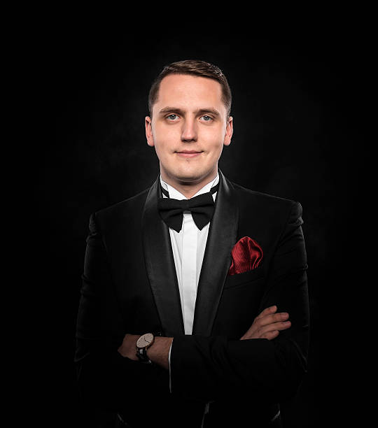 istock Young handsome man in black suit. 537728490