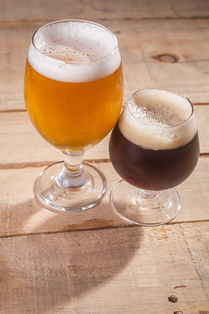 istock Dark and light beer on wood 537729110