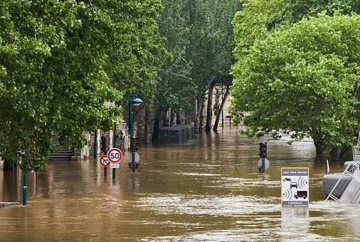 Heavily flooded riverbed of stream Mali graben at Ljubljana - Vic District. Newly built water barrier saved the district from fatal flood. Heavy rain caused the biggest flood in Slovenia in it's modern history in August 2023.