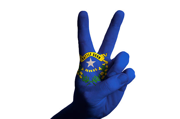 istock nevada us state flag two finger up gesture for victory 537739207