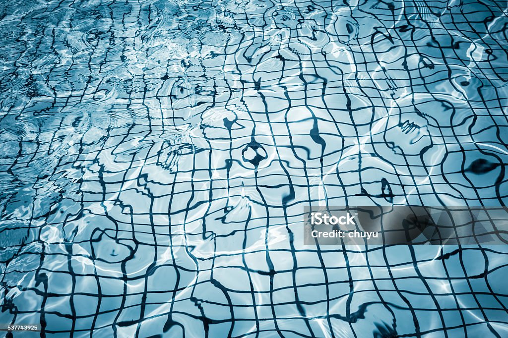 water surface of the pool background water surface of the pool background with waves texture Backgrounds Stock Photo