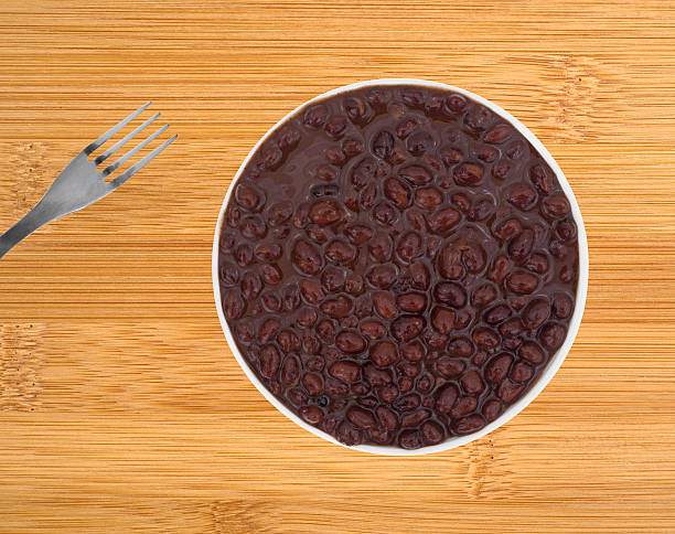 istock Plate of black beans in a chili sauce with fork 537743929