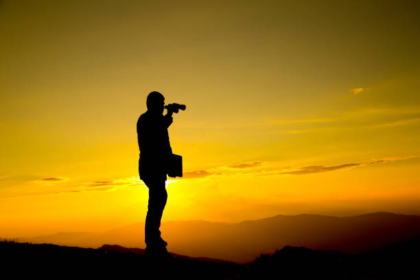 istock Businessman hold laptop and watch binoculars for his vision 537759519