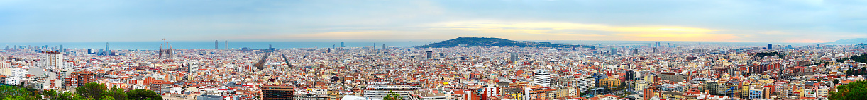Wide panoramic view of Barcelona at beautiful sunset. Spain