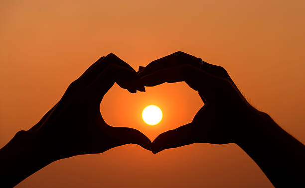 istock Man and Women hand doing Love shape silhouette 537762833