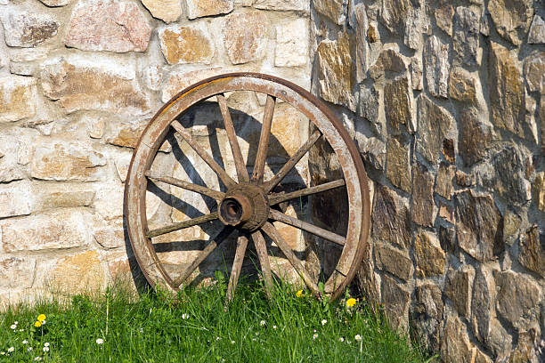 istock Old wooden wagon wheel 537763469