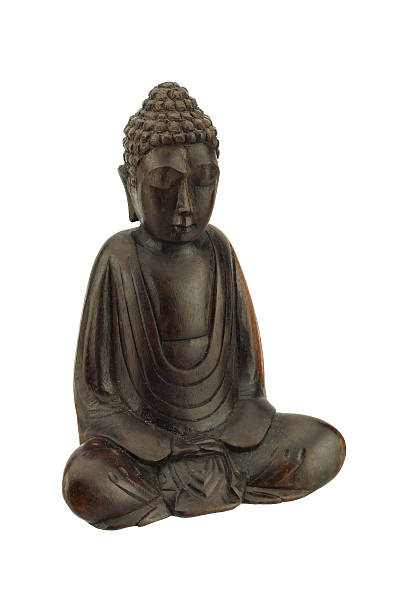 istock Wooden Buddha statue isolated on white background 537764193