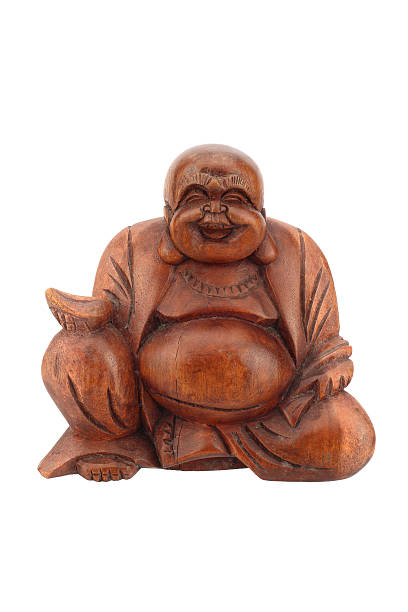 istock Wooden Buddha statue isolated on white background 537764199