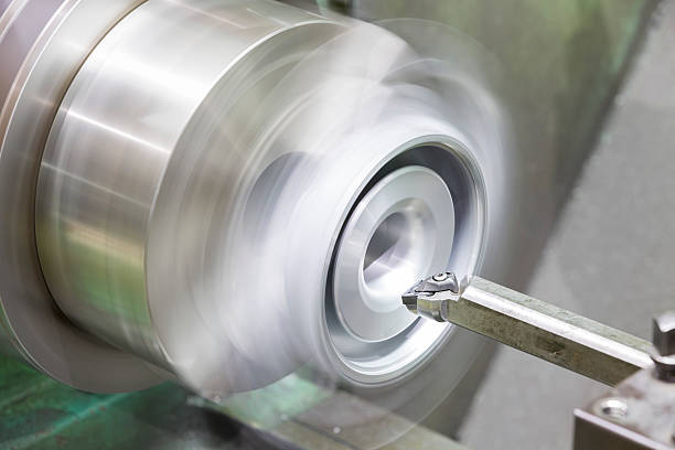 istock operator turning automotive parts by cnc lathe 537764993