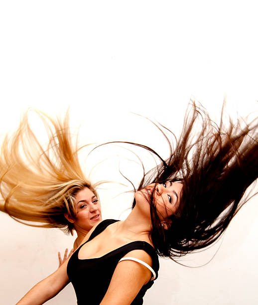 istock Two Beautiful  Woman Shaking Her Hair 537790905