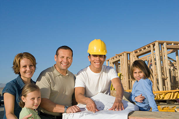 istock Family at construction site with manager 537791047