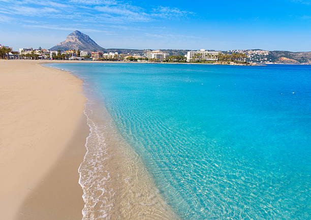 javea xabia playa del arenal в средиземноморском испания - javea стоковые фото и изображения