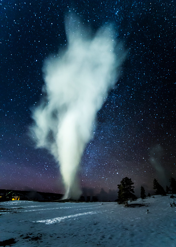 Taken at night, this is Old Faithful going off under the stars.