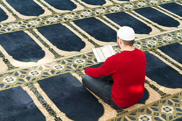 istock Young muslim man showing Islamic prayer 537793725