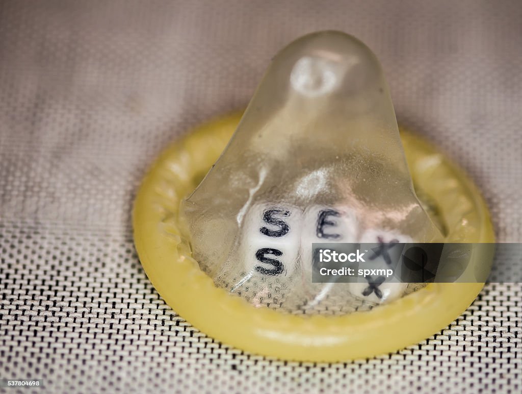 Topic Sex / Safer Sex Sex with condom Human Sexual Behavior Stock Photo