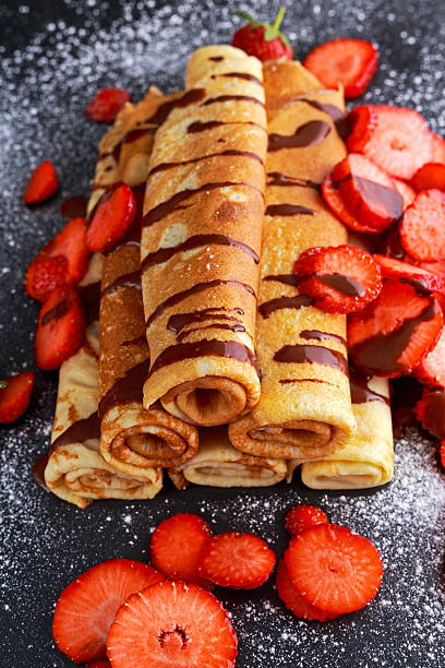 istock Sweet Rolled Pancakes with nutella and strawberry 537806002