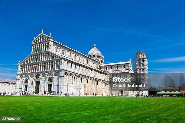 Tourists On Square Of Miracles Visiting Leaning Tower In Pisa Stock Photo - Download Image Now