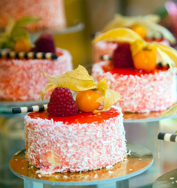 istock cakes decorated with berries on a show-window of shop 537806366