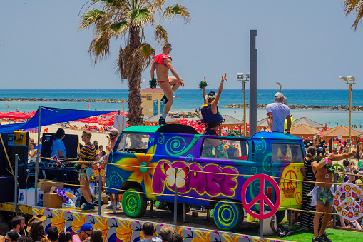 Tel-Aviv, Israel - June 3, 2016: Dancers on a truck entertain the crowd in the Pride Parade in the streets of Tel-Aviv, Israel. Its part of an annual event of the LGBT community