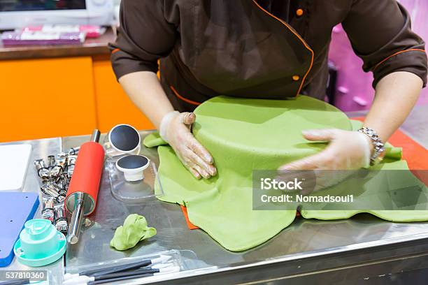 Baker With Gum Paste Stock Photo - Download Image Now - Cake, Decorating, Adult