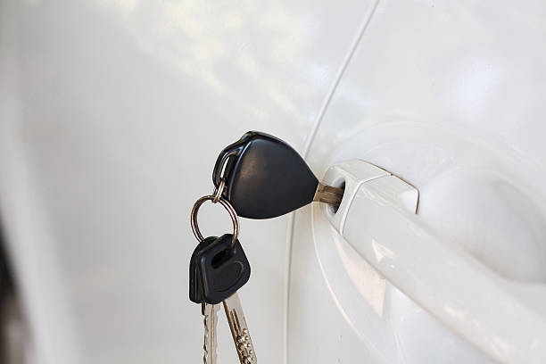 istock Car keys left in the car door 537813232