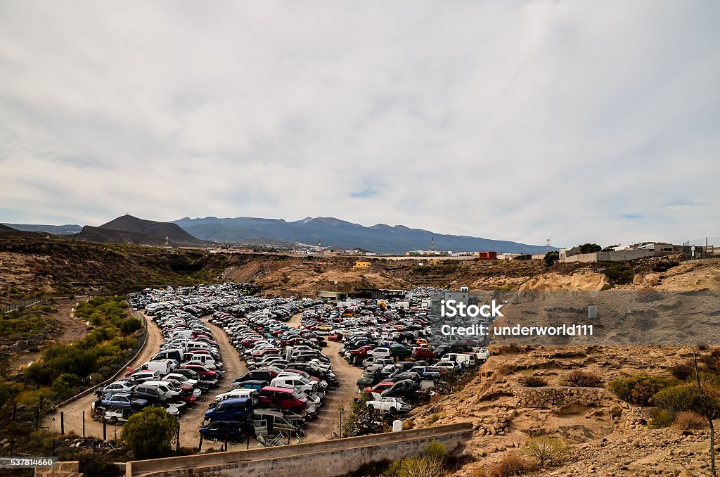 Old Junk Cars On Junkyard Scrap Yard With Pile Of Crushed Cars in tenerife canary islands spain Abandoned Stock Photo