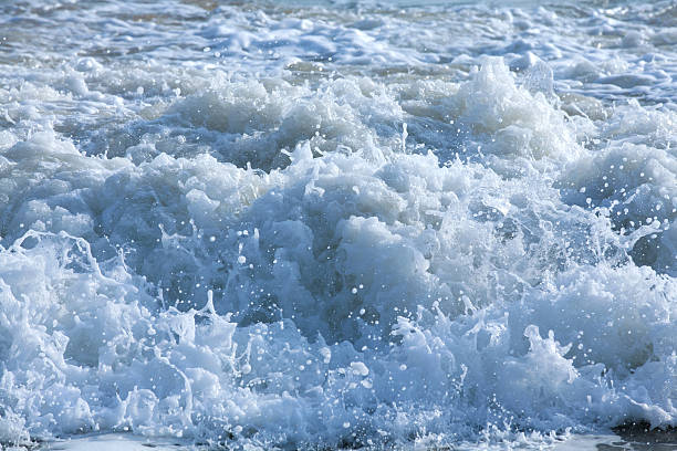 Splashes of blue sea stock photo
