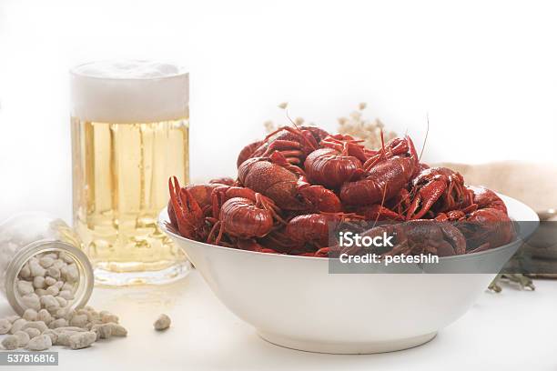 Boiled Big Crawfish On The White Surface With A Beer Stock Photo - Download Image Now