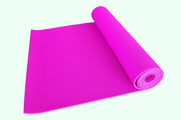 istock Purple yoga mat isolated on white 537816836