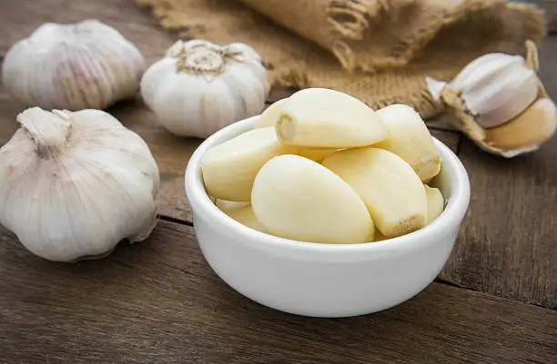 Photo of Peeled garlic in bowl