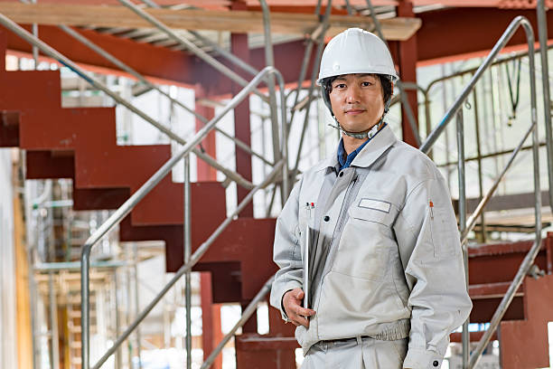 Engineer or inspector at a building construction site stock photo