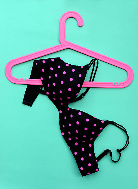 istock Summer concept, bra on coat hanger on blue. (Pop art style) 537818160