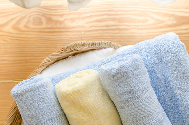 istock Selective focus of towels in wicker basket at home 537818204