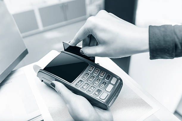 istock Debit card swiping on pos terminal. 537819768