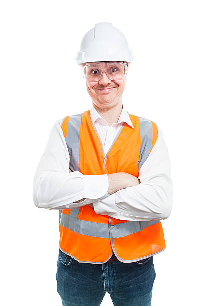 istock Nerd in safety gear with arms folded smiling at Camera 537819980
