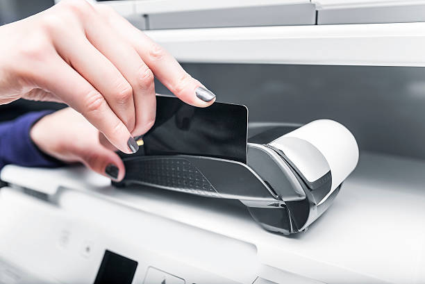 istock Debit card swiping on pos terminal. 537820250