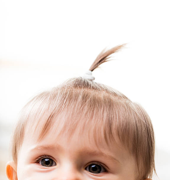 istock pigtail of a very young child 537820426