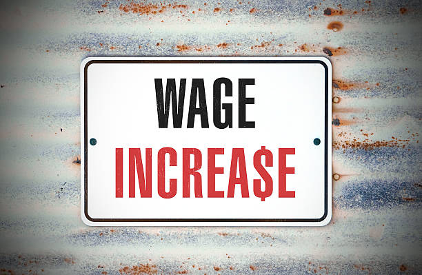 Wage Increase A sign that says "WAGE INCREA$E." minimum wage stock pictures, royalty-free photos & images