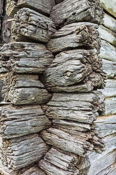 istock Old wooden wall made of brown logs 537820950