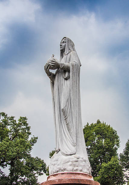 istock the Blessed Virgin Mary Statue blue sky background 537821670