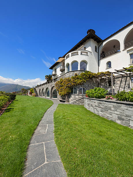 istock beautiful villa with green garden 537821932