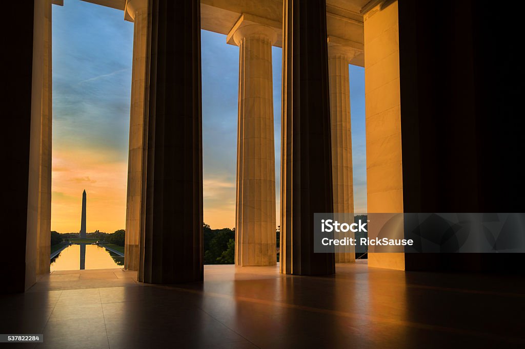 Washington Monument from Lincoln Memorial at Sunrise in Washington, DC Early morning summer sunrise as seen from the Lincoln Memorial while looking toward the Washington Monument in Washington, DC. Washington DC Stock Photo