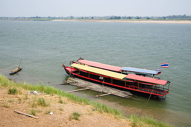 istock Wooden boat floating on a river 537823180