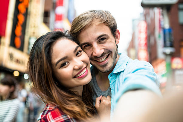 istock lovers take a selfie in Tokyo 537824418