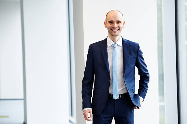 istock Cheerful young businessman in the office 537825464