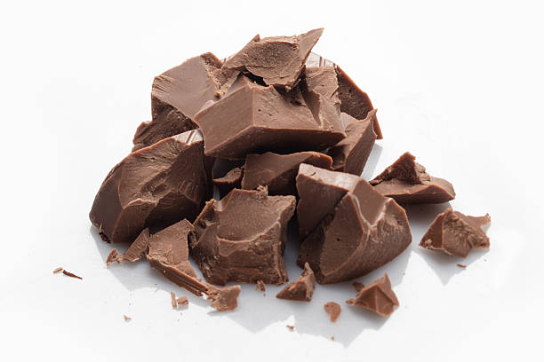 istock Pieces of milk chocolate isolated on white 537825634