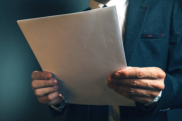 istock Lawyer reading legal contract agreement 537826580