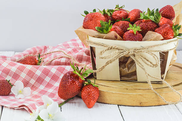 istock fresh berries, strawberries in basket, food 537827376