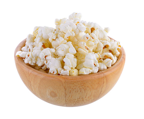 istock popcorn in wood bowl isolated on white background 537828094