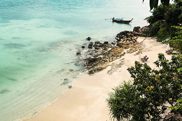 istock The beach with clear blue sea, from above view 537830324